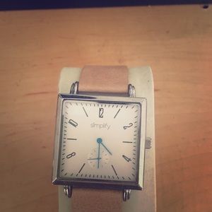 Simplify tan and white face with teal hour hands